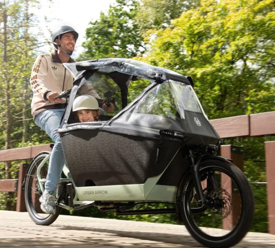 Gratis regenhuif bij aankoop van de nieuwe Urban arrow family next 